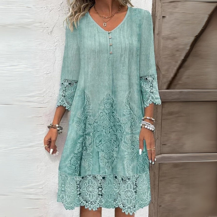 Sophisticated women's relaxed fit midi shift dress with 3/4 sleeves, versatile for daytime, casual, or office.