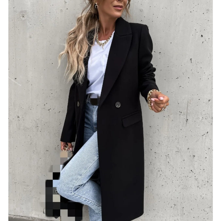 Tailored women's double-breasted long coat, elegant and warm, with a prominent lapel collar for winter comfort.