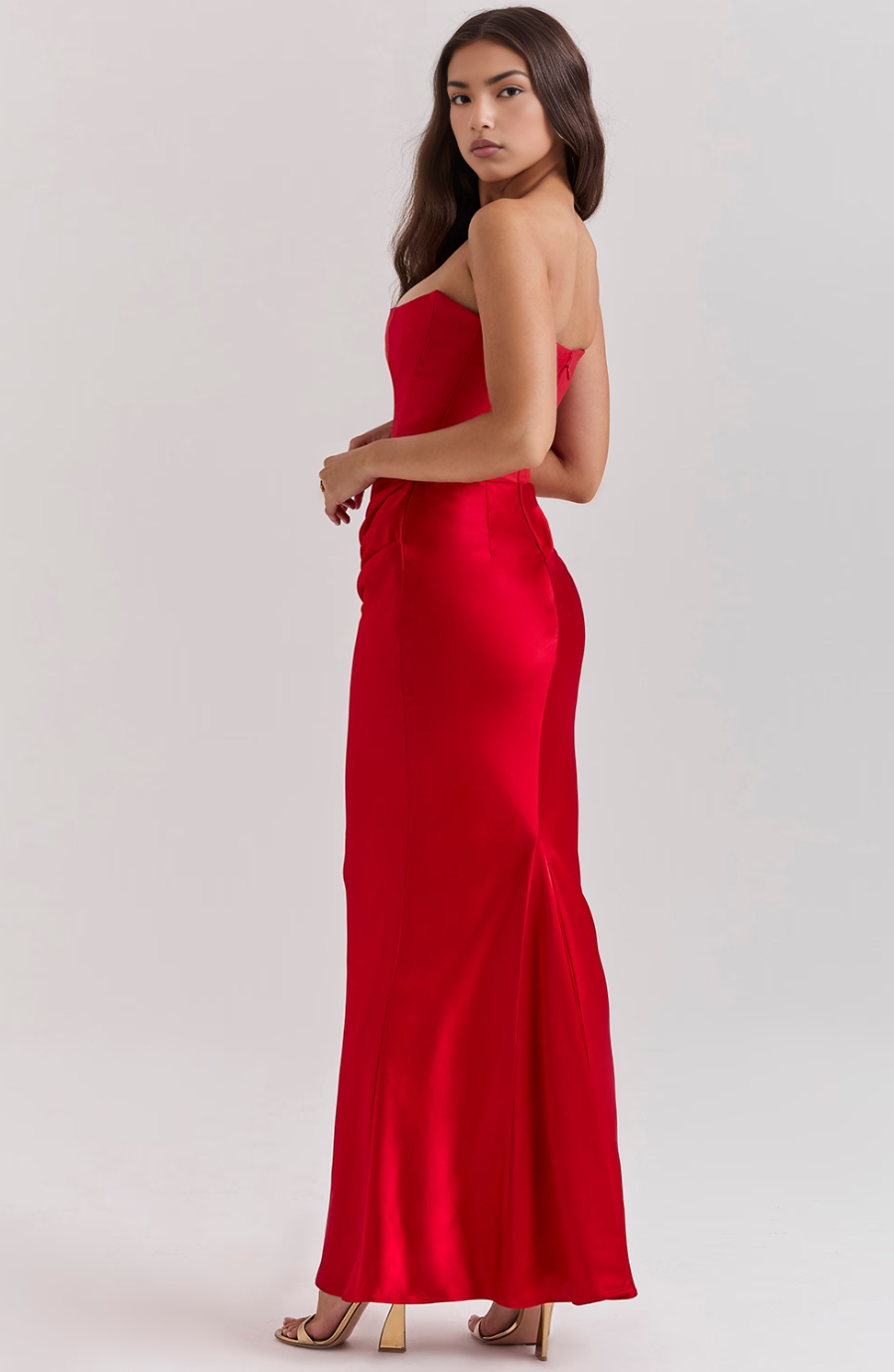 Special occasion strapless dress, a draped fitted column silhouette.