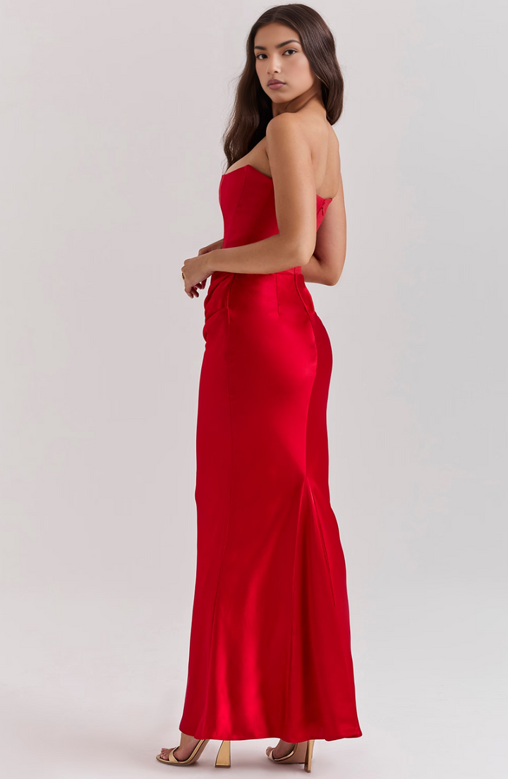 Special occasion strapless dress, a draped fitted column silhouette.