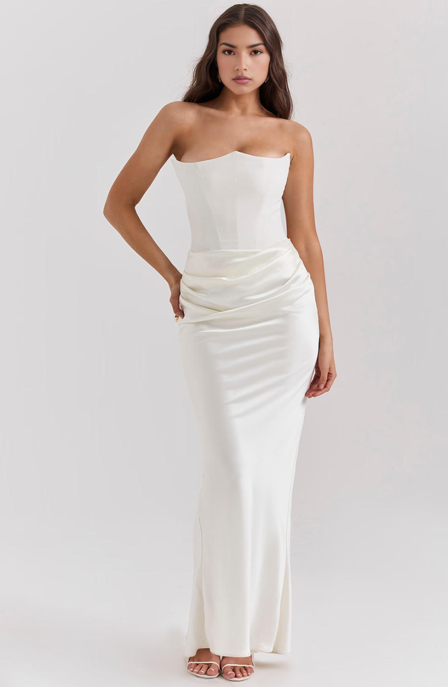 Elegant strapless formal evening dress with a draped fit.