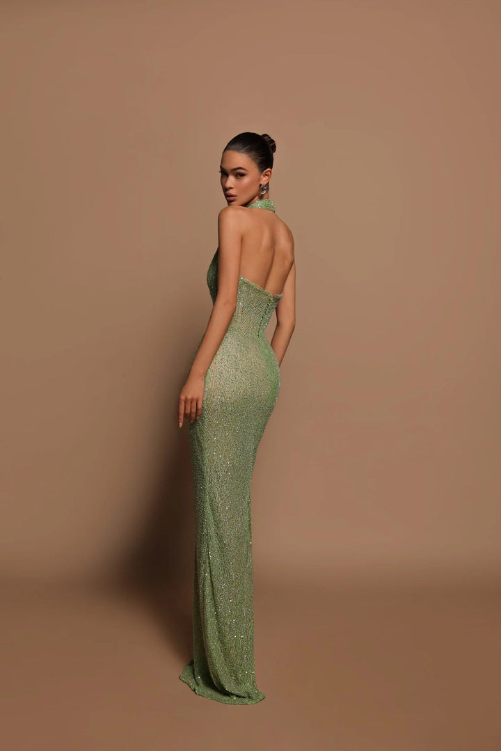 Radiant emerald maxi dress for women, featuring a sophisticated long sleeve design & elegant flowing fit.