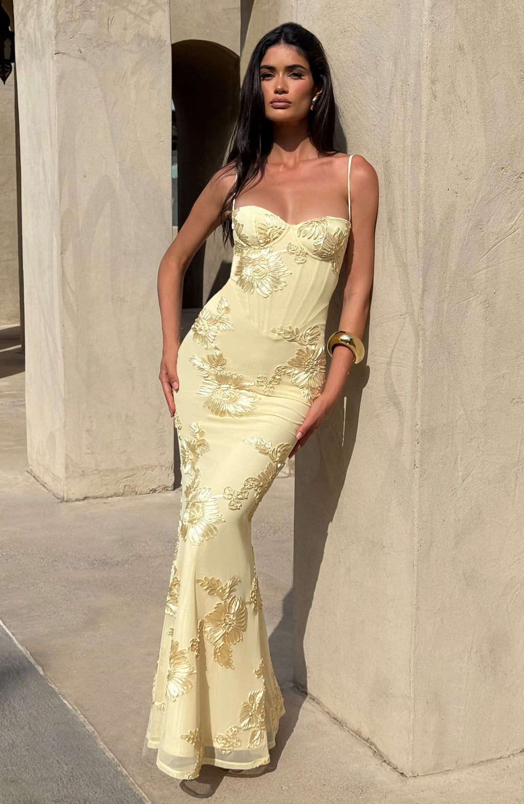 Special occasion formal wear: women's floral appliqué corset mermaid maxi dress with spaghetti straps.