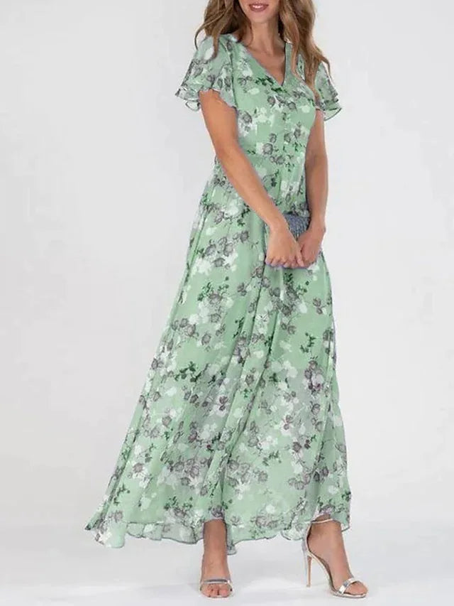 Chic women's floral print maxi dress with flutter sleeves & V-neck, ideal for beach, summer events or occasion wear.