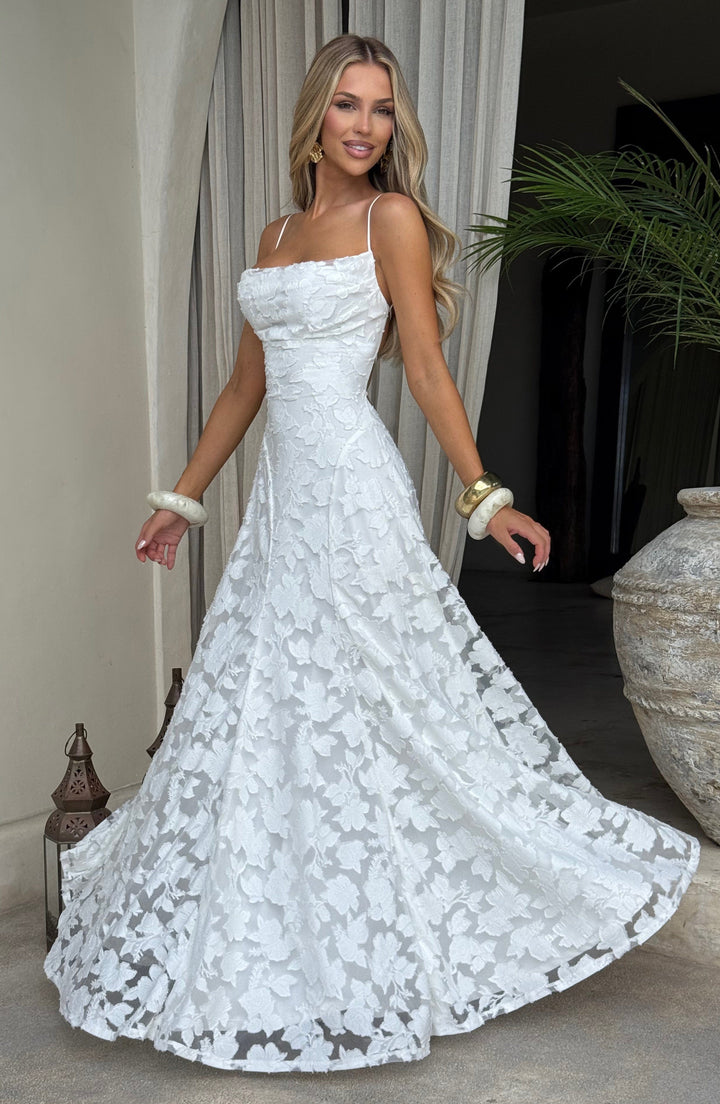 Elegant women's summer floral maxi dress with a dramatic waterfall neckline and delicate lace-up back.