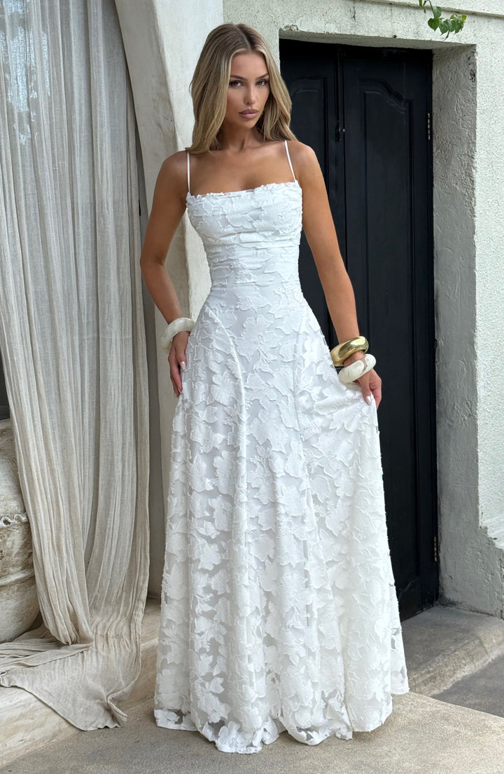 Floral print maxi dress for women, ideal for sunny days, with a stylish waterfall neckline & lace-up back.