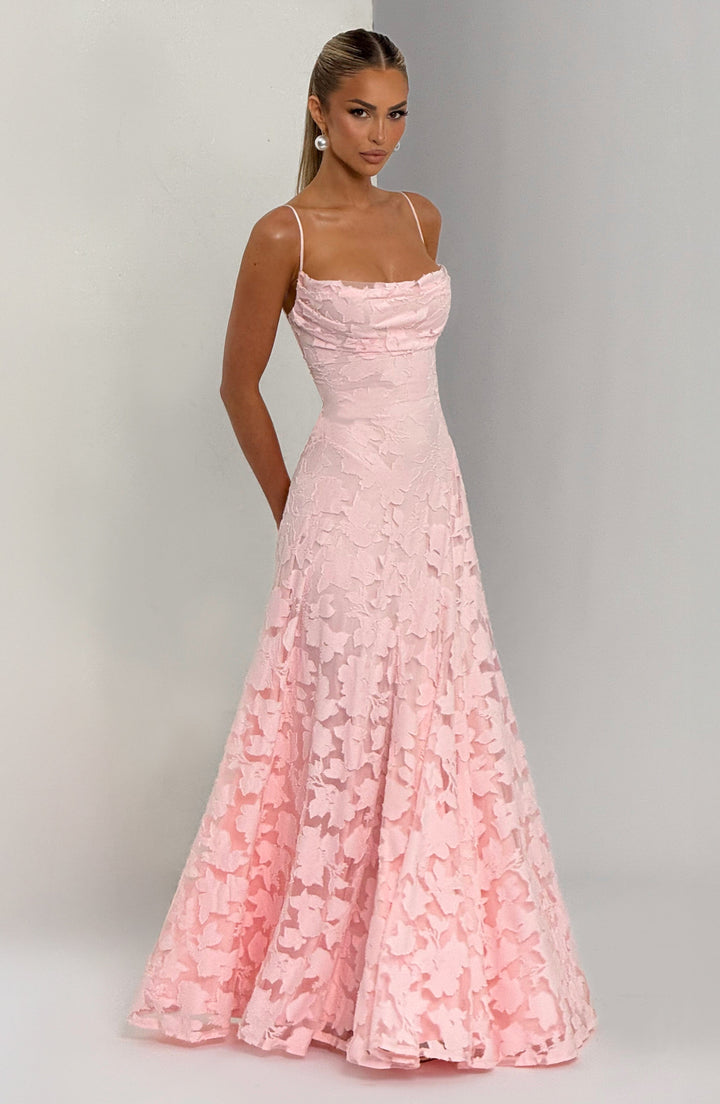 Chic women's party dress: long floral maxi, sleeveless, waterfall neckline, and eye-catching lace-up back.