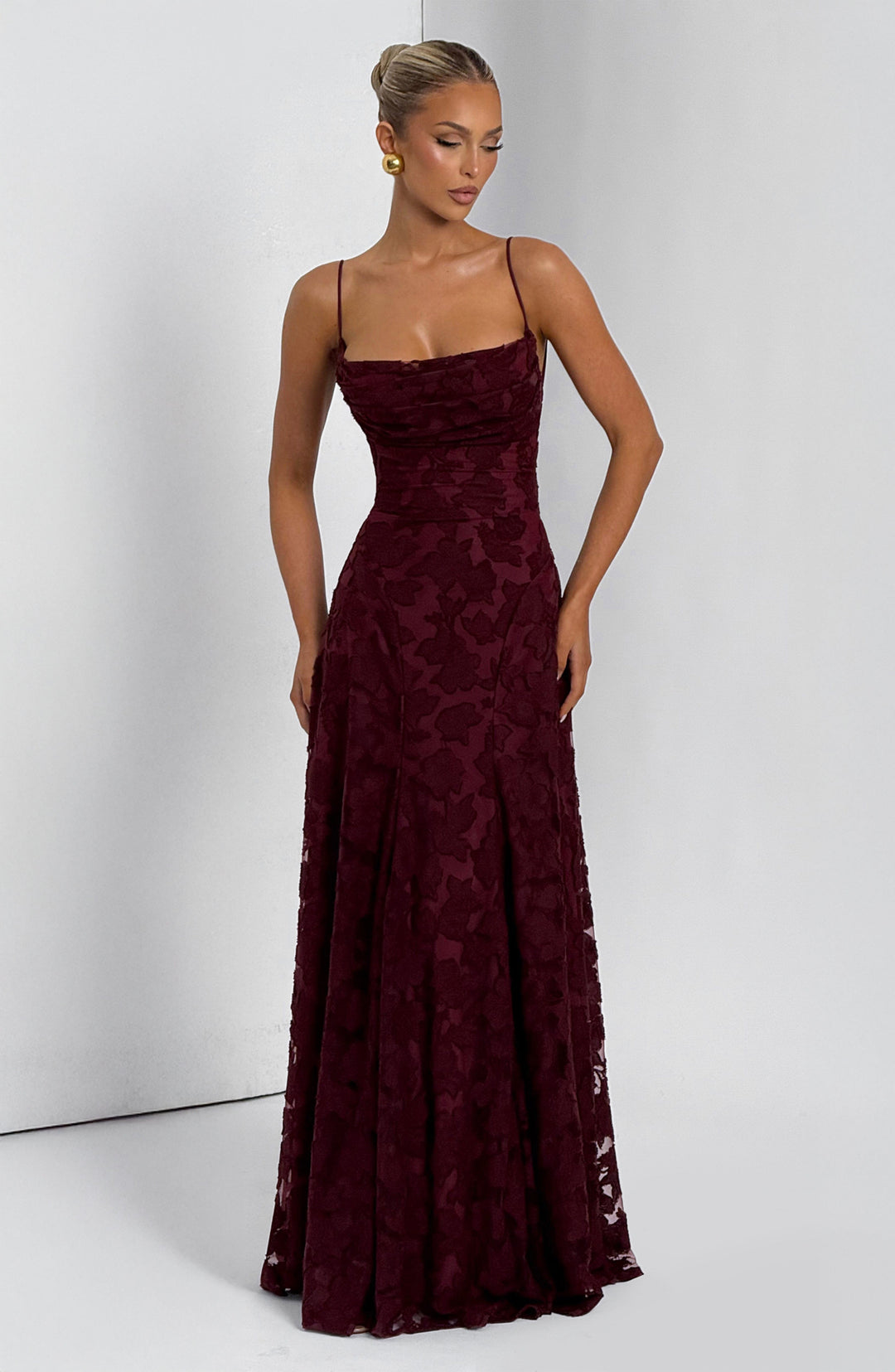 Elegant women's floral dress, maxi length, with a unique waterfall neckline and functional lace-up back.