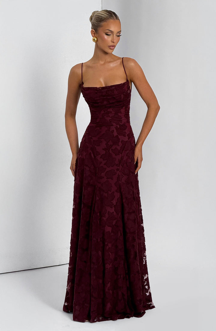 Elegant women's floral dress, maxi length, with a unique waterfall neckline and functional lace-up back.