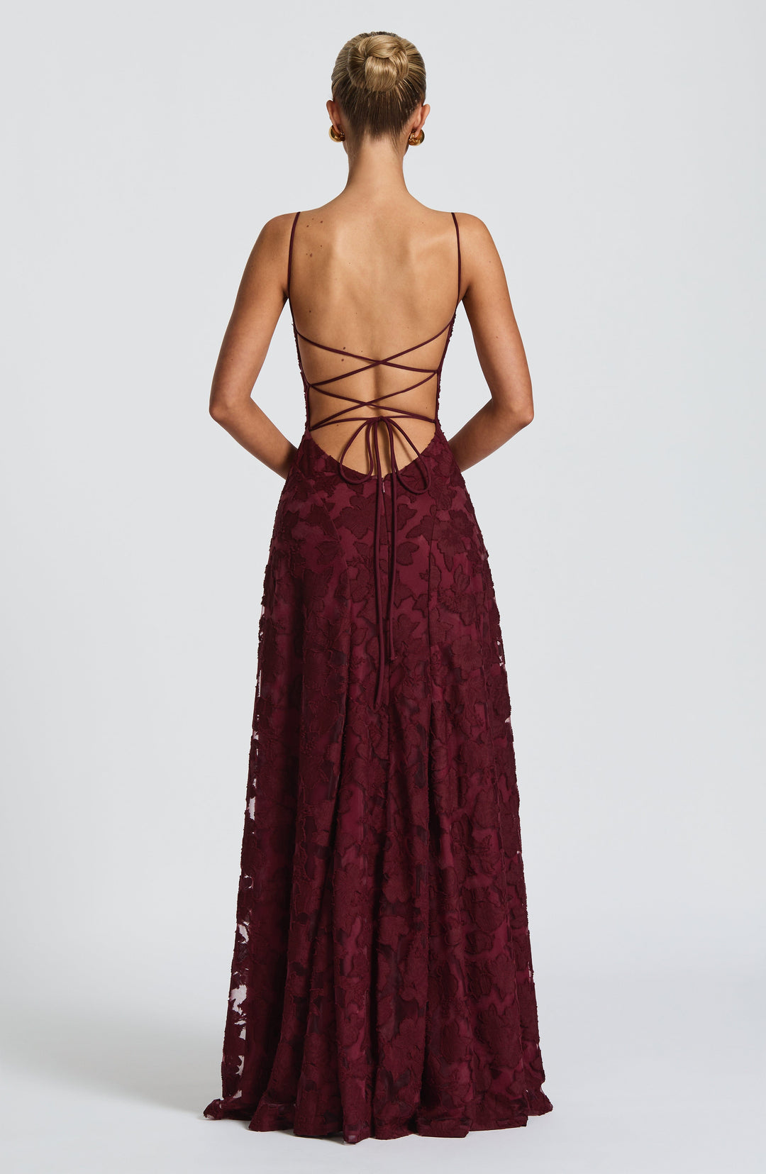 Women's long floral occasion dress, featuring a waterfall neckline that drapes beautifully and a lace-up back.
