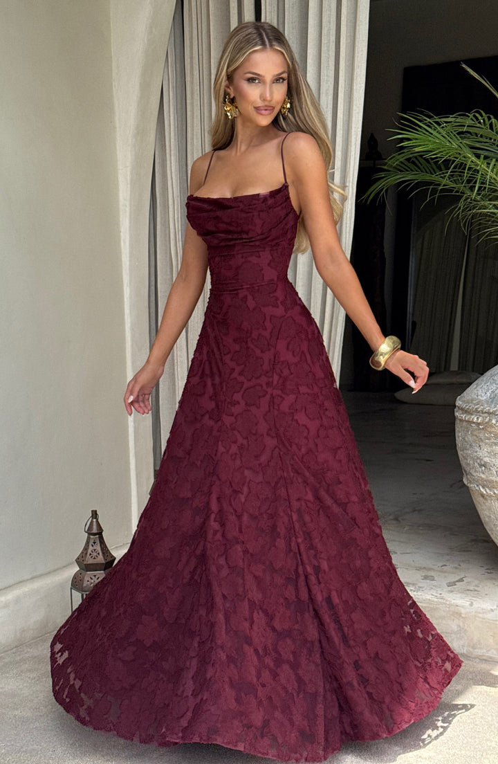 Spring floral women's maxi dress, with a flattering A-line cut, waterfall neckline, and stylish lace-up back.