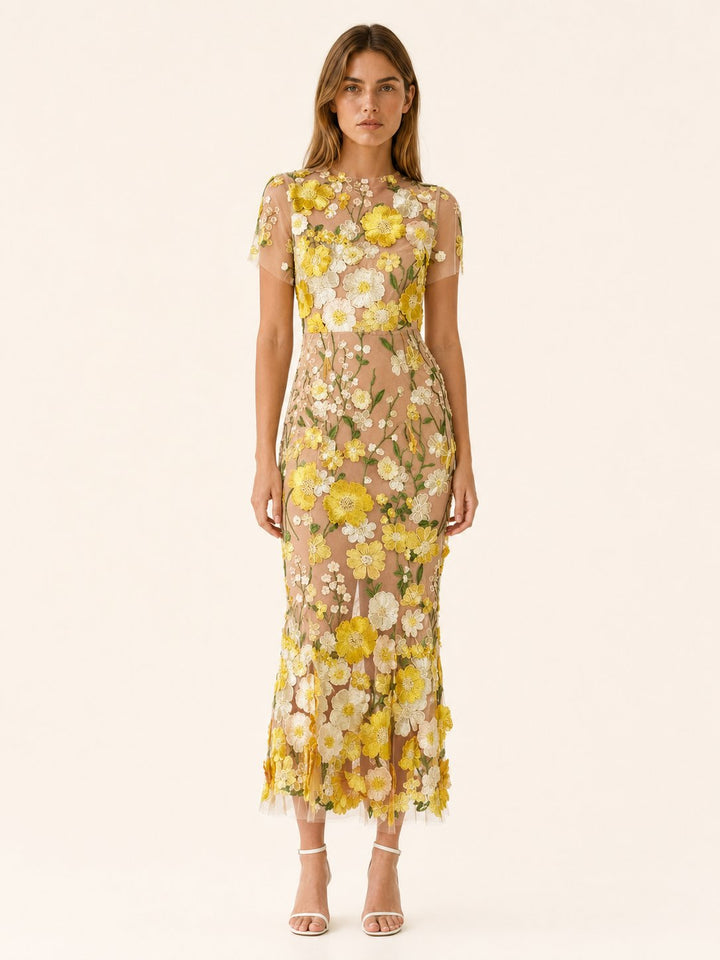 Women's elegant floral midi dress with short sleeves, perfect as a wedding guest or formal occasion outfit.