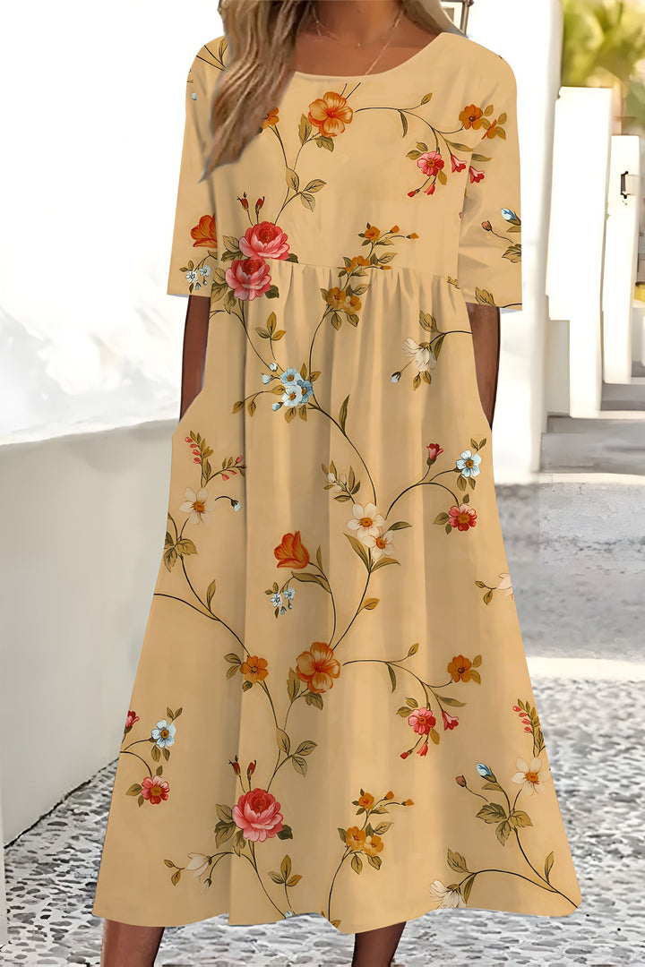 Women's elegant floral midi wrap dress. Flattering design, perfect for summer parties or spring fashion. Multicolour.