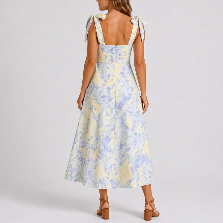 Full shot: Women's vibrant floral print A-line midi dress featuring ruched bodice & adjustable straps, summer style.