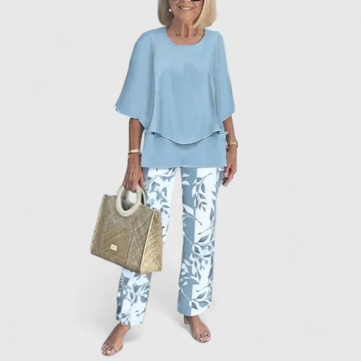 Chic women's floral wide leg two piece set, suitable for spring and summer events.