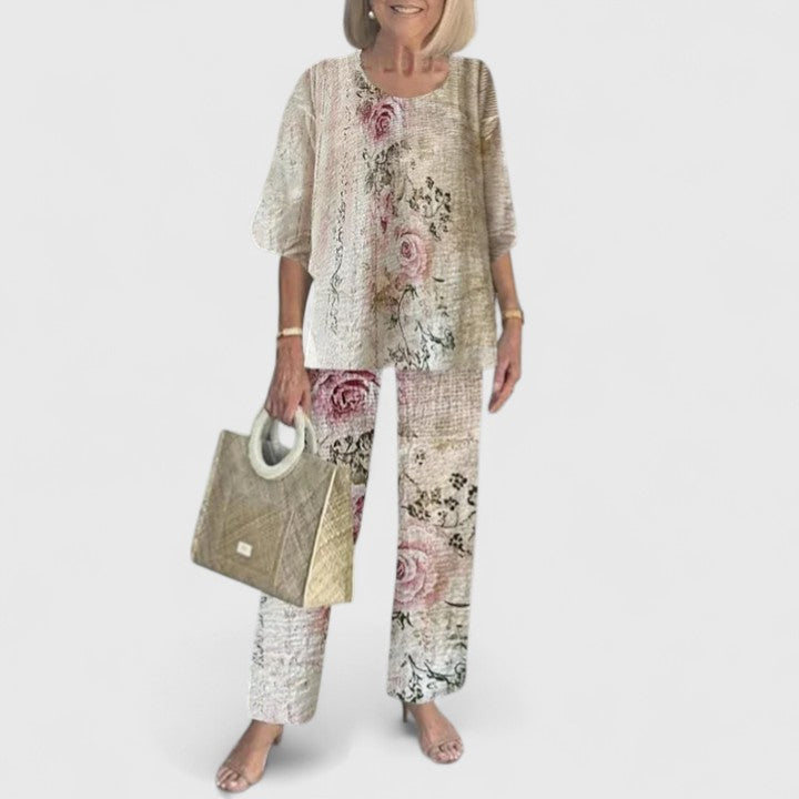 Women's floral print wide leg pants & layered top, an elegant casual outfit.
