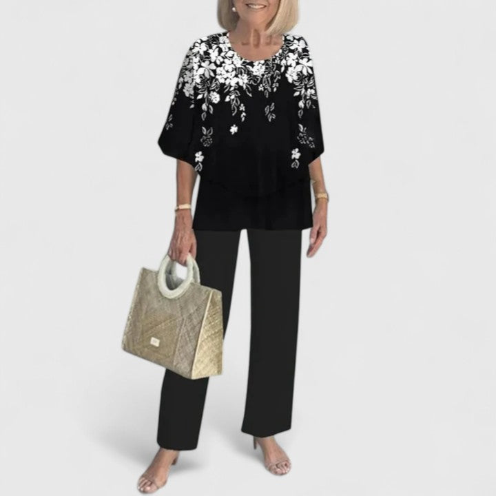 Stylish women's two piece floral outfit, wide leg pants for a breezy summer look.