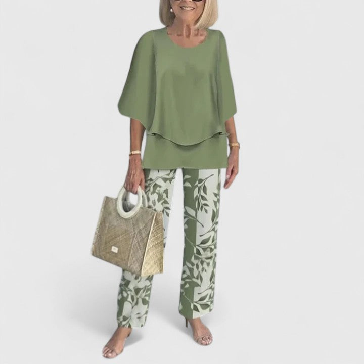 Stylish women's floral two piece set with wide leg pants & layered top for spring.