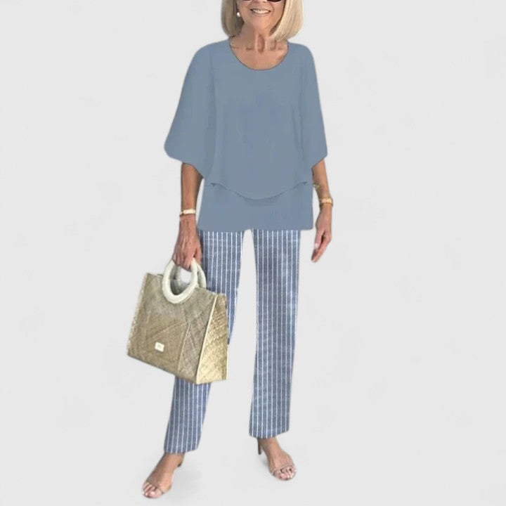 Casual chic women's matching floral print wide leg trousers and top outfit.