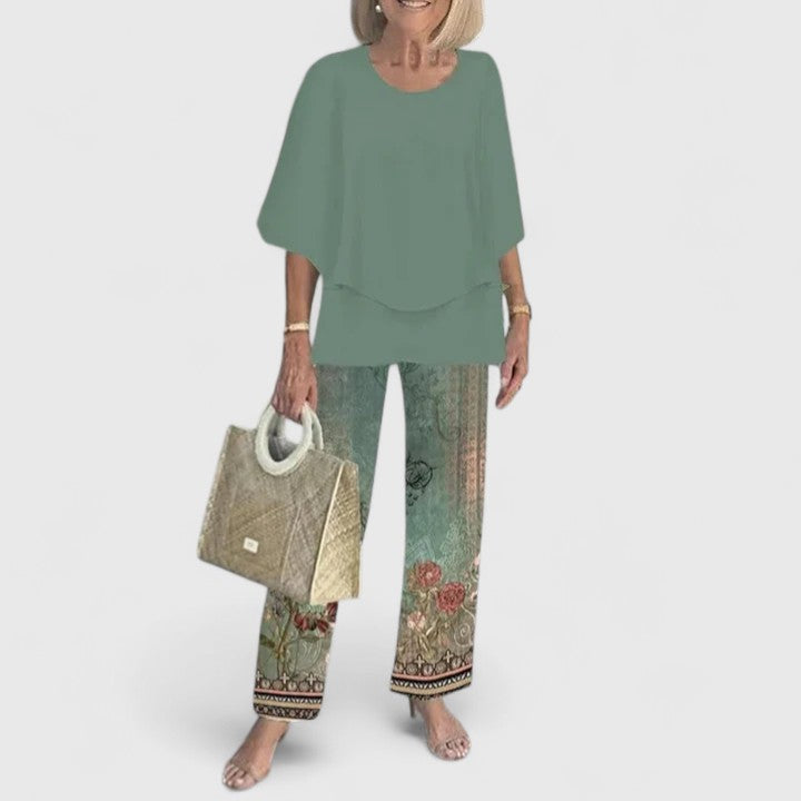 Women's vibrant floral wide leg pants and matching top set; spring/summer wear.