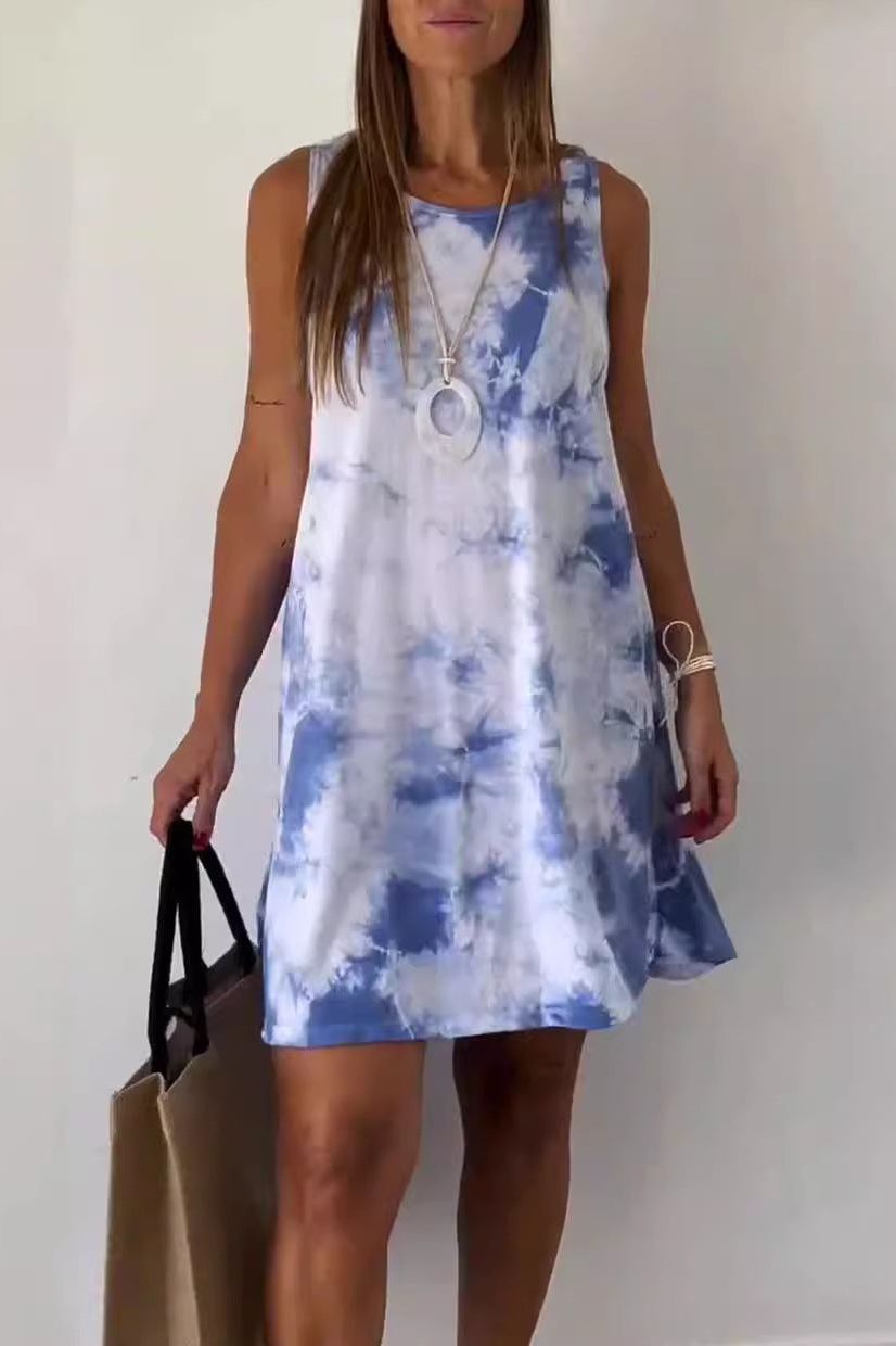 Blue women's spring midi dress with sophisticated floral print, perfect flattering day dress for fashion.