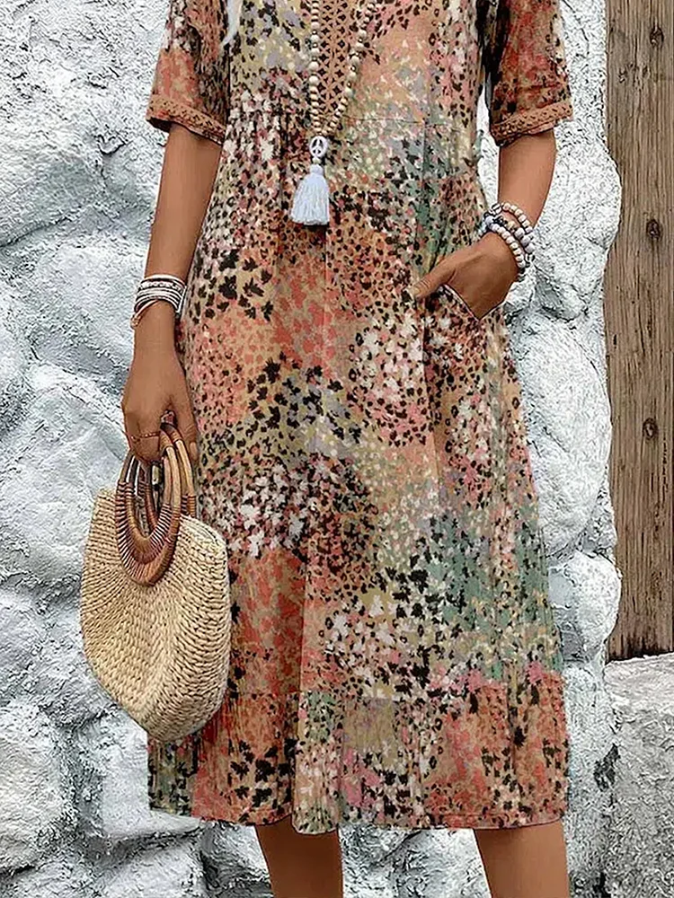 Versatile women's floral printed V-neck midi dress. An elegant A-line cut for casual or special summer events.