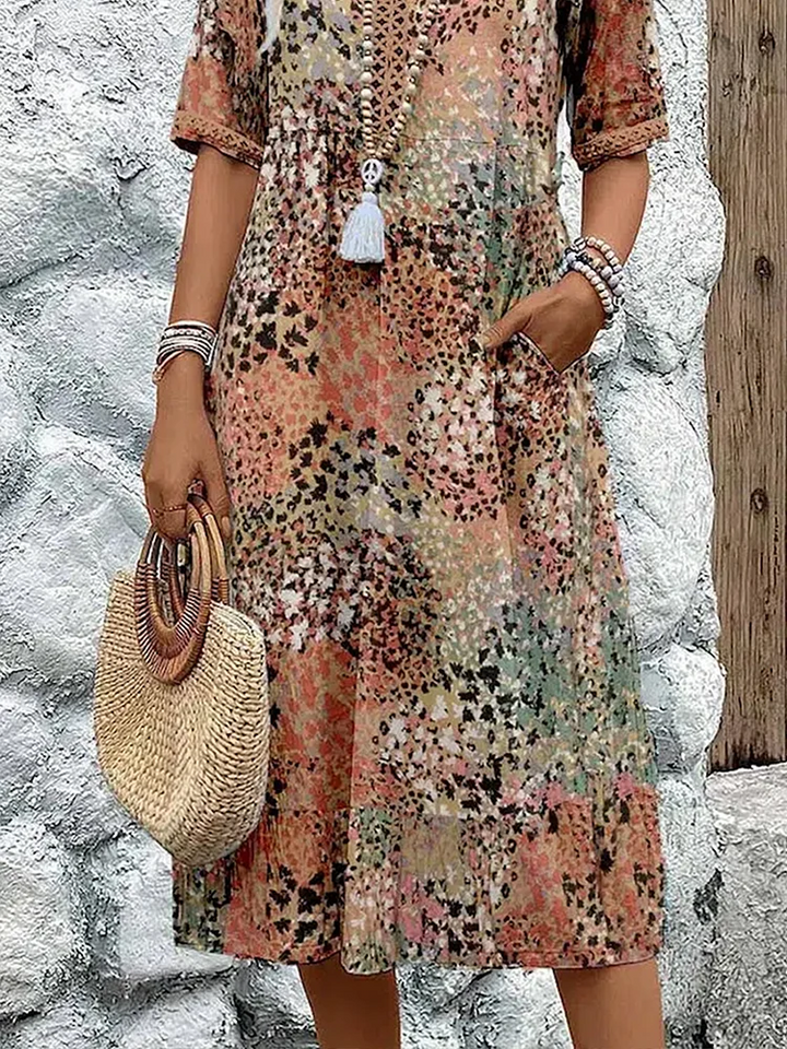 Versatile women's floral printed V-neck midi dress. An elegant A-line cut for casual or special summer events.