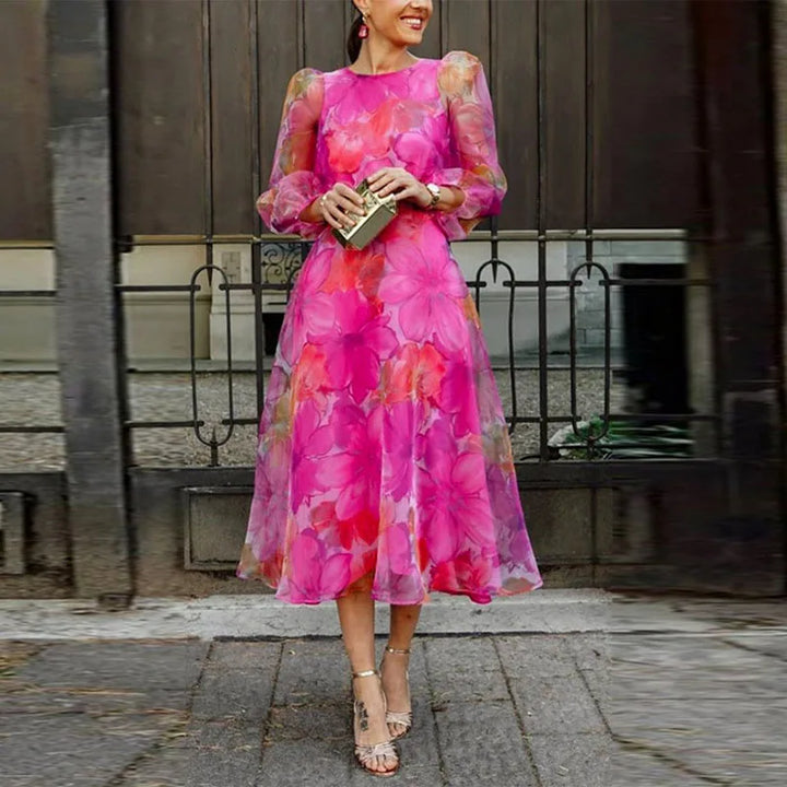 Women's elegant floral puff sleeve midi dress, perfect for wedding guests, parties, or formal occasions. A-line silhouette.