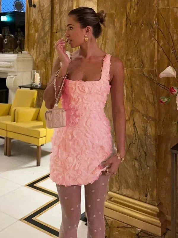 Glamorous slim fit floral mini cocktail dress for women, textured, ideal for evening events.