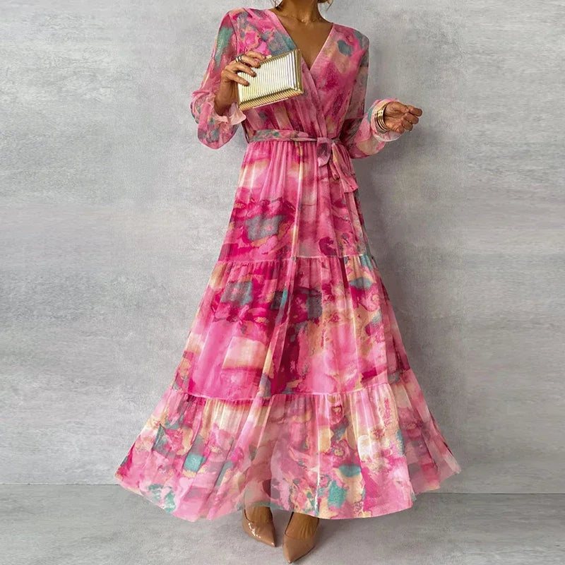 Women's elegant floral V-neck wrap maxi dress with long sleeves & tiered skirt, perfect for wedding guests.