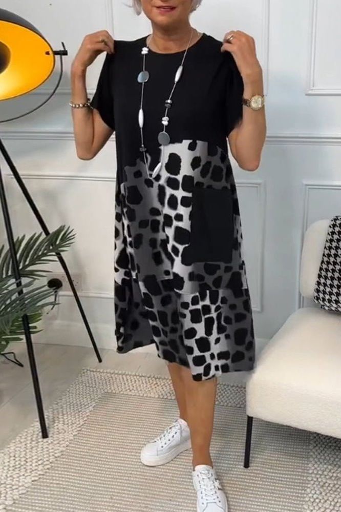 Women's elegant floral waist-defined midi dress. Perfect for spring & summer.