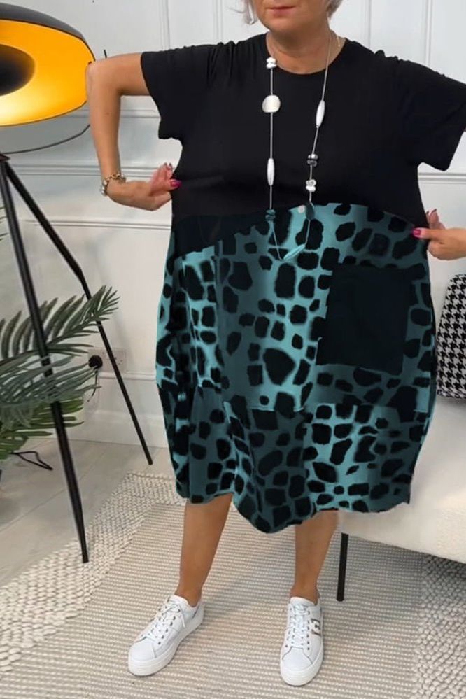 Women's casual floral waist-defined midi dress, comfortable & chic for spring days.