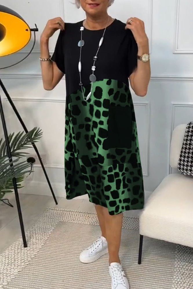 Feminine women's waist-defined floral midi dress. A versatile and flowy spring style.