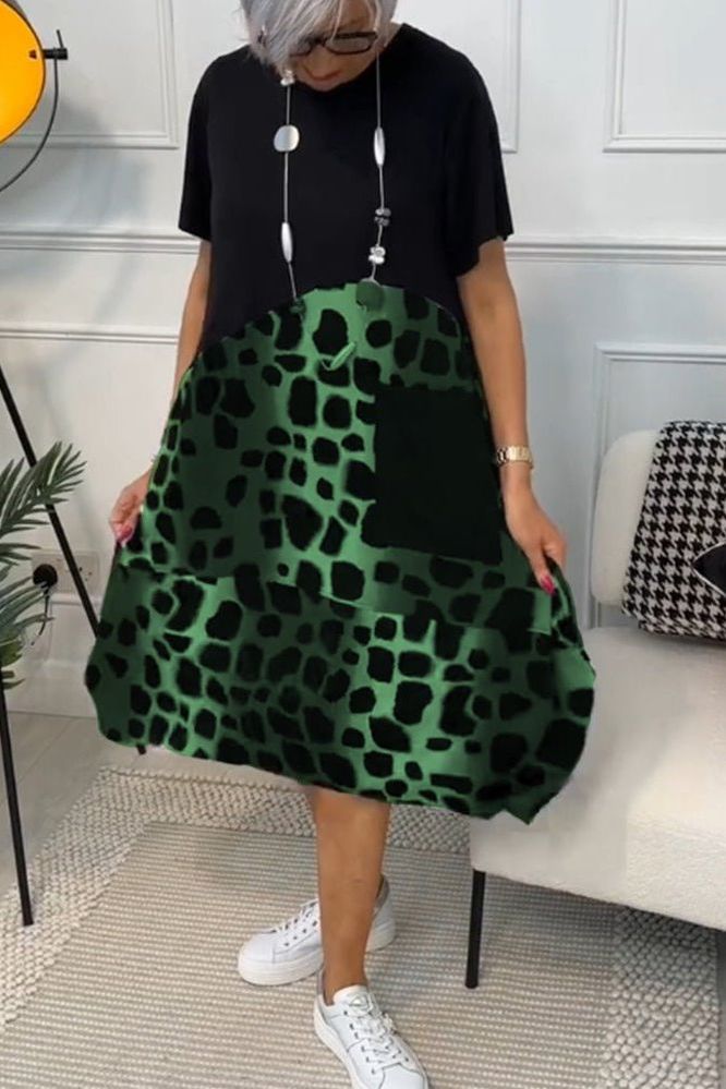 Chic women's floral waist-defined midi dress. A versatile & feminine addition to your wardrobe.