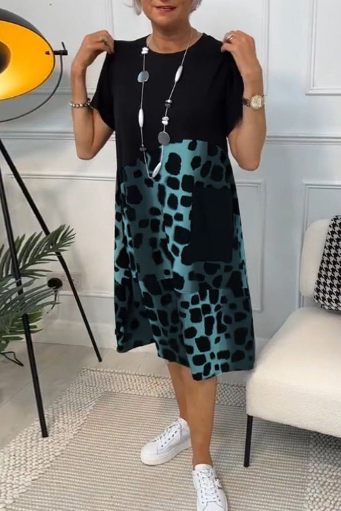 Graceful women's floral midi dress with defined waist, a perfect spring & summer outfit.