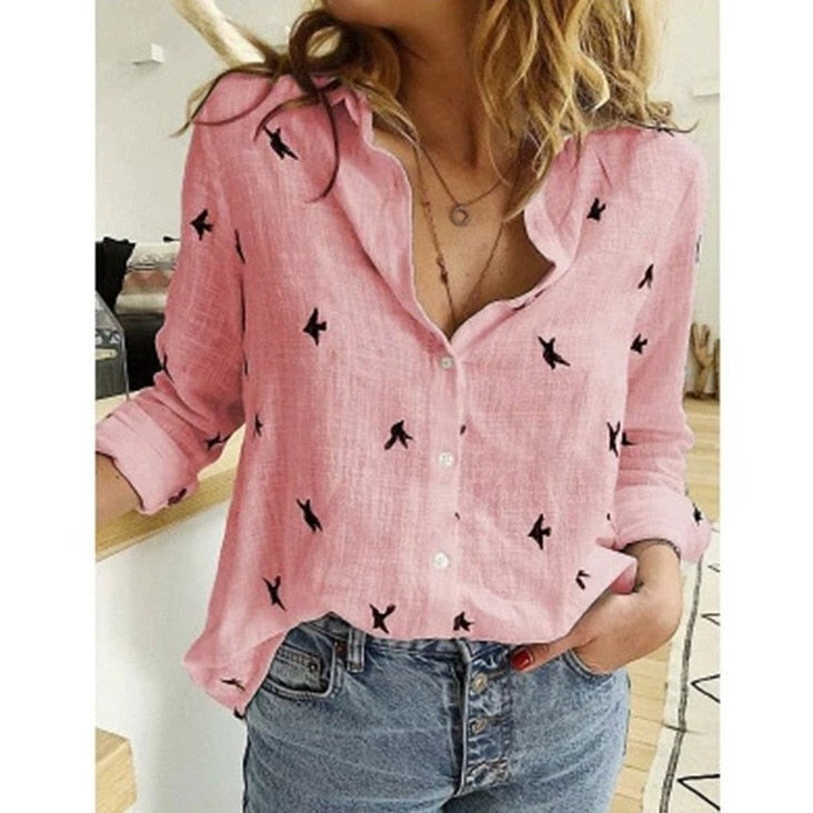 Women's elegant flowy blouse, versatile for casual wear or professional outfits.