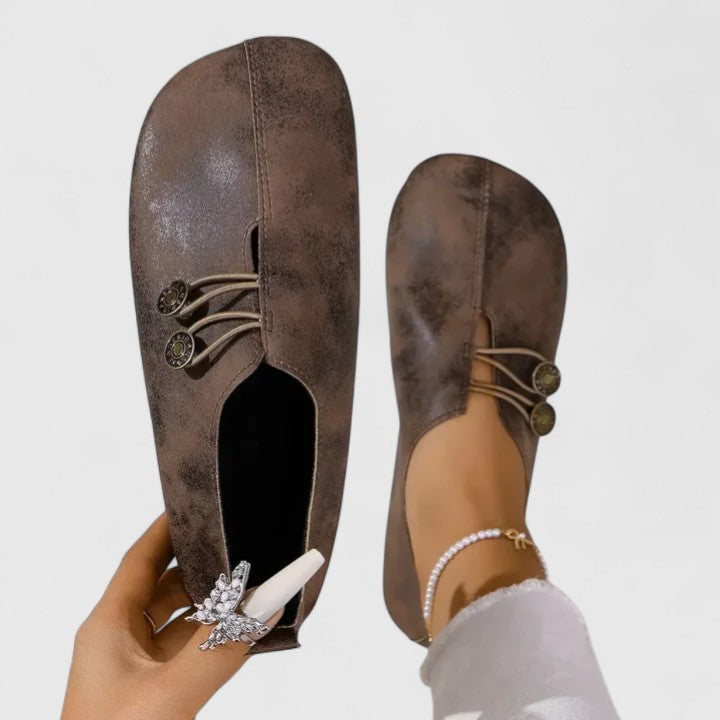 Elegant women's loafers featuring elastic button closure. Foldable & comfortable slip-on shoes, ideal for travel.