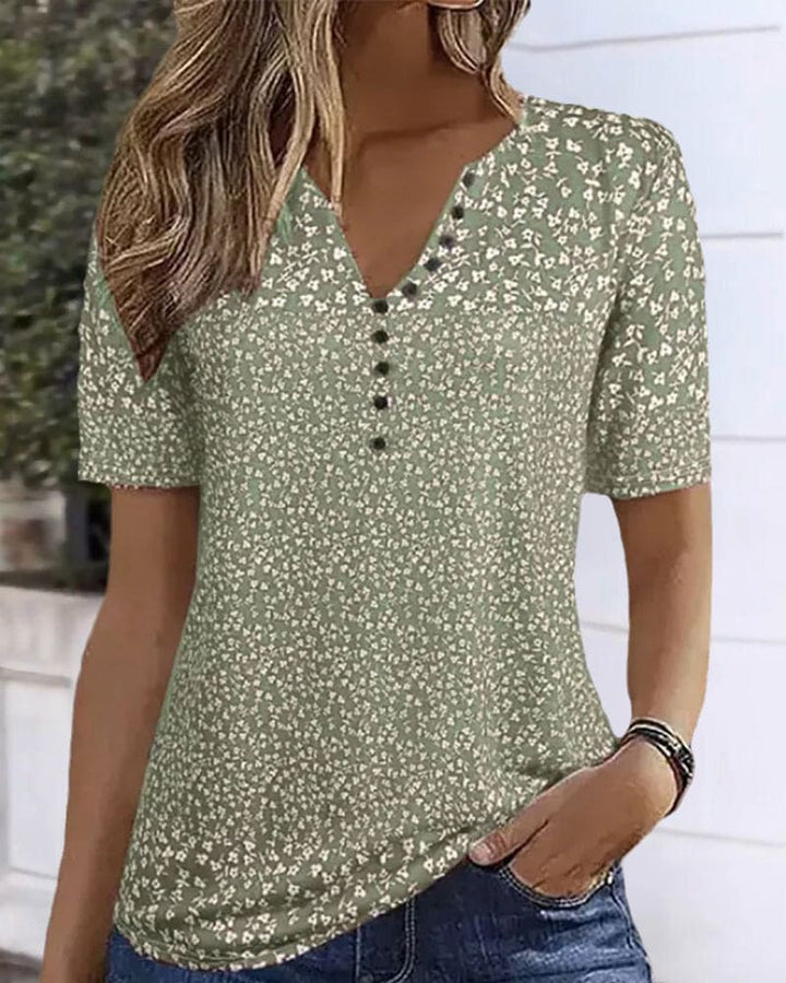 Women's elegant green floral summer blouse with short sleeves, lightweight & stylish for casual wear.