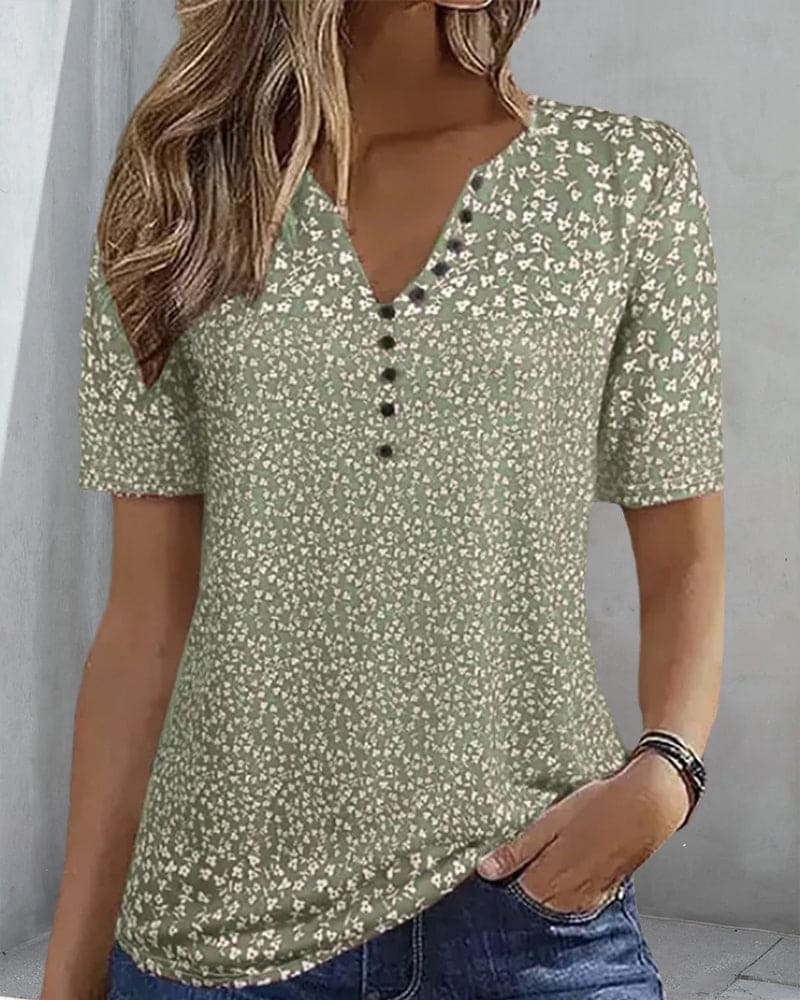Lightweight women's green floral blouse. Elegant short sleeve summer shirt, comfortable & stylish for everyday fashion.