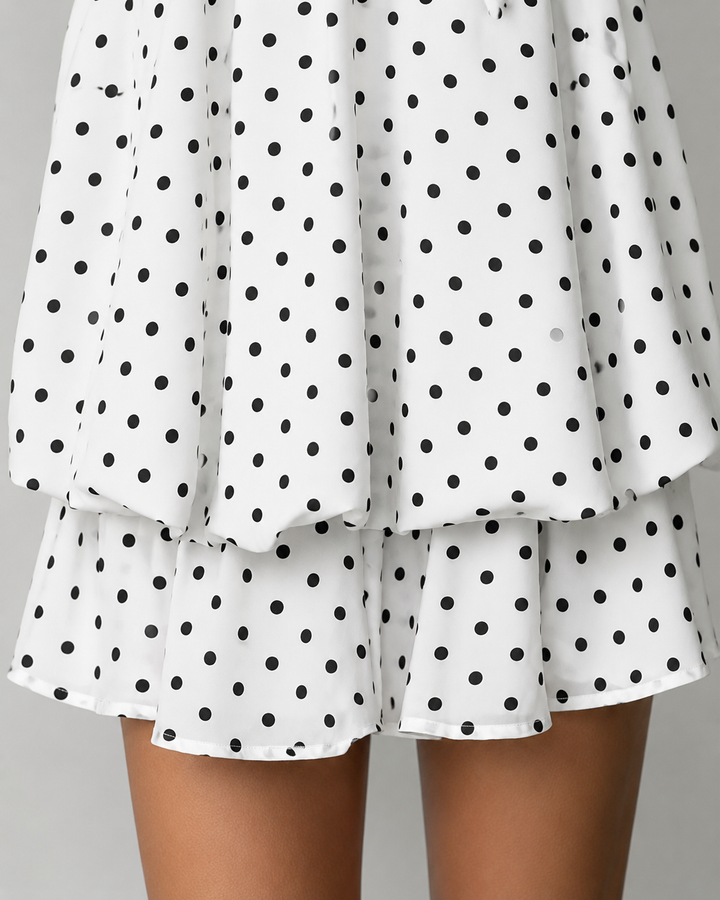 Women's cocktail halter mini dress, showcasing a graceful ruffle hem and a sophisticated open back.