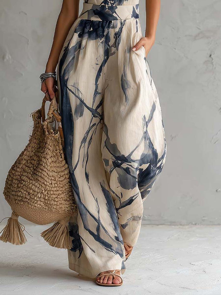 Versatile women's halter neck wide leg jumpsuit, designed with functional pockets for an elegant yet casual look.