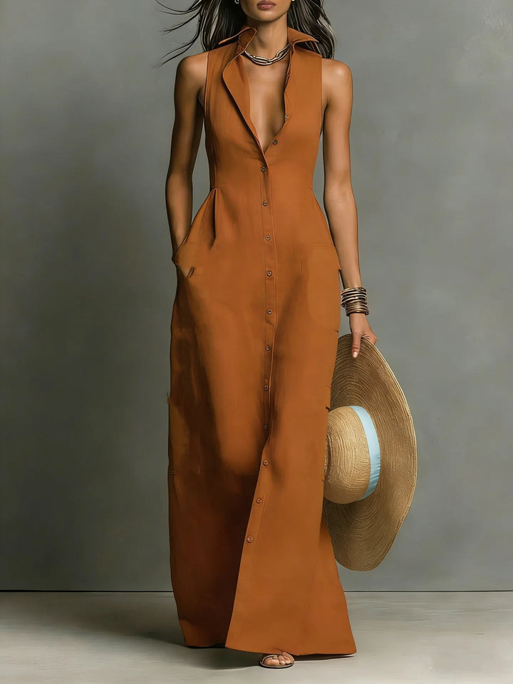 Textured view of the fabric and elegant design of a women's sleeveless lapel button-front maxi shirt dress.