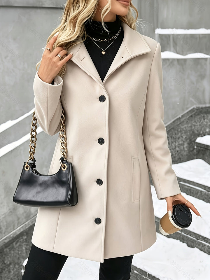 Women's elegant fall/winter longline coat, a chic notch collar and tailored design for cold weather.