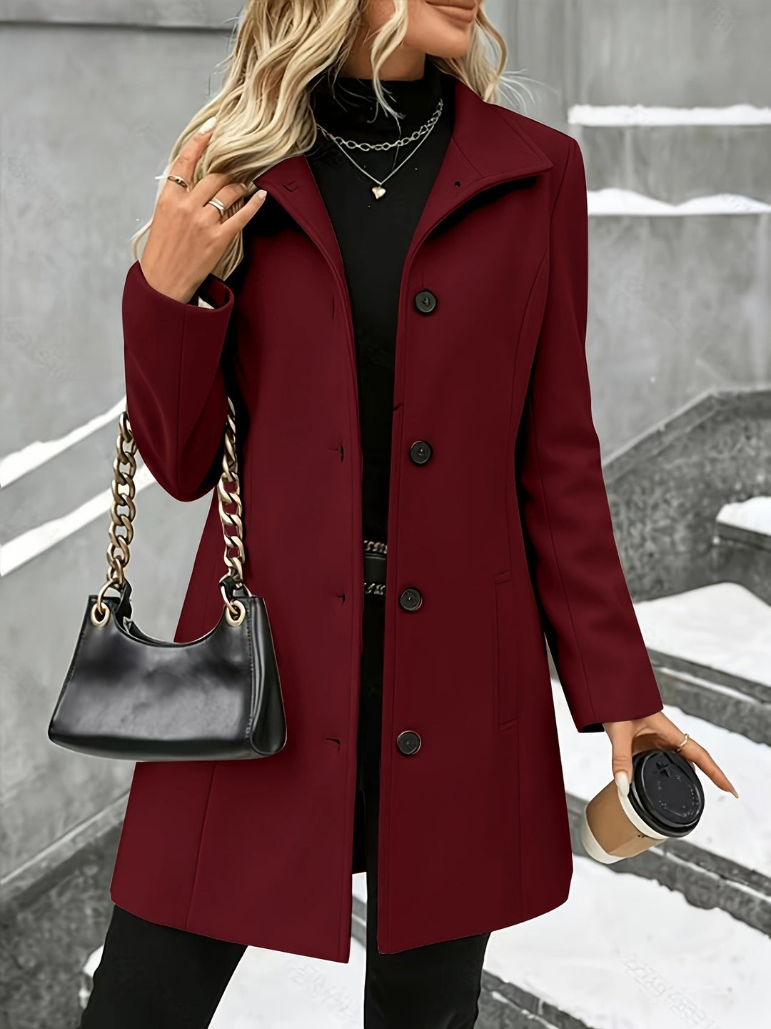 Stylish women's fall fashion longline coat, elegant outerwear with a sophisticated notch collar.