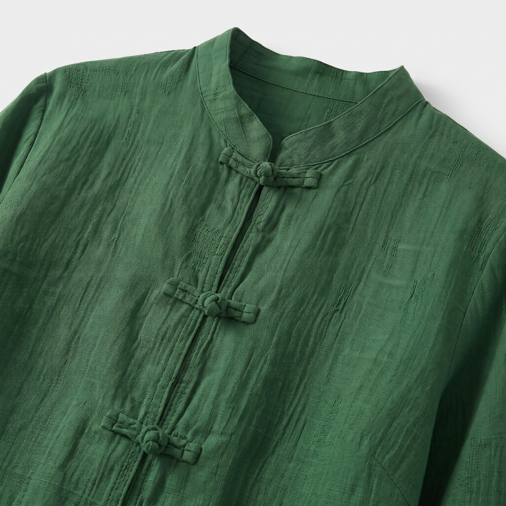 Casual summer women's blouse, tailored fit, with mandarin collar and stylish frog button accents.