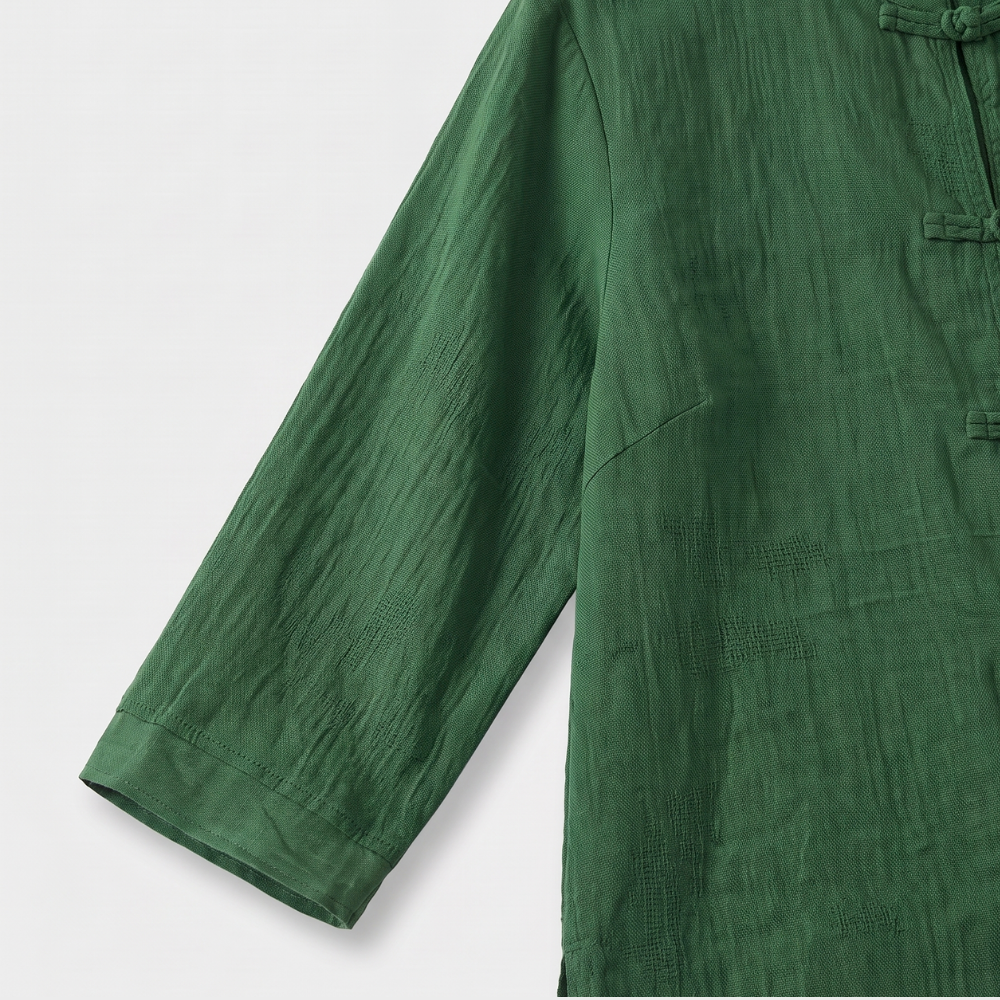 Women's work wear blouse: elegant mandarin collar, unique frog buttons, three-quarter sleeves. Chic style.