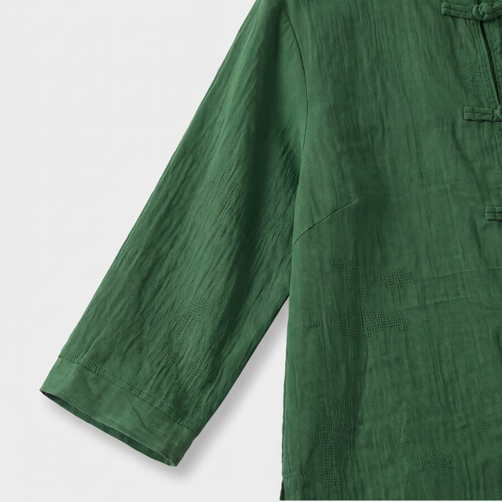 Women's work wear blouse: elegant mandarin collar, unique frog buttons, three-quarter sleeves. Chic style.