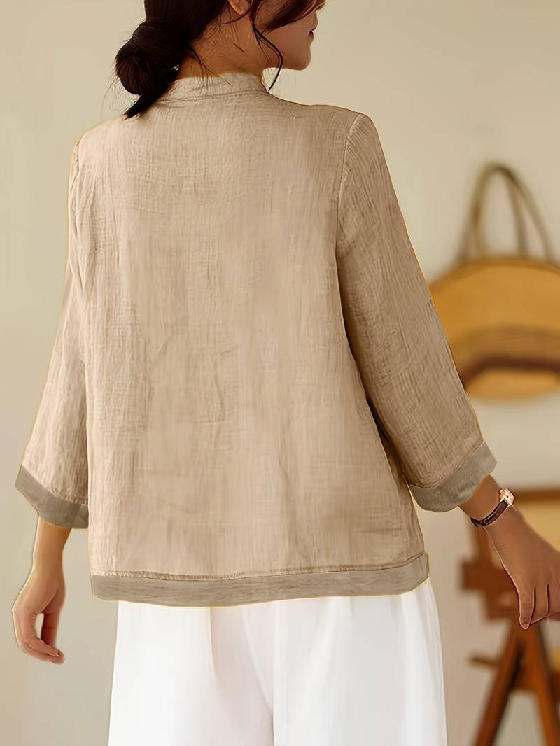 Women's casual elegant blouse, mandarin collar, frog buttons, tailored fit. Great for warm weather.