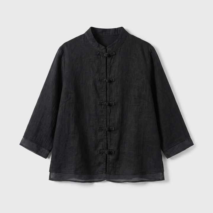 Women's tailored fit blouse with elegant mandarin collar and frog button detailing. Three-quarter sleeve.