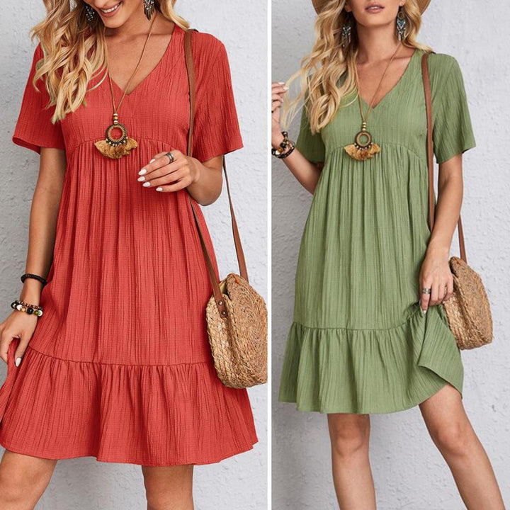 Women's elegant midi dress with flattering belly coverage, short sleeve, round neck, perfect for versatile wear.